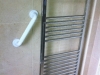 Heated towel rail and grab rail